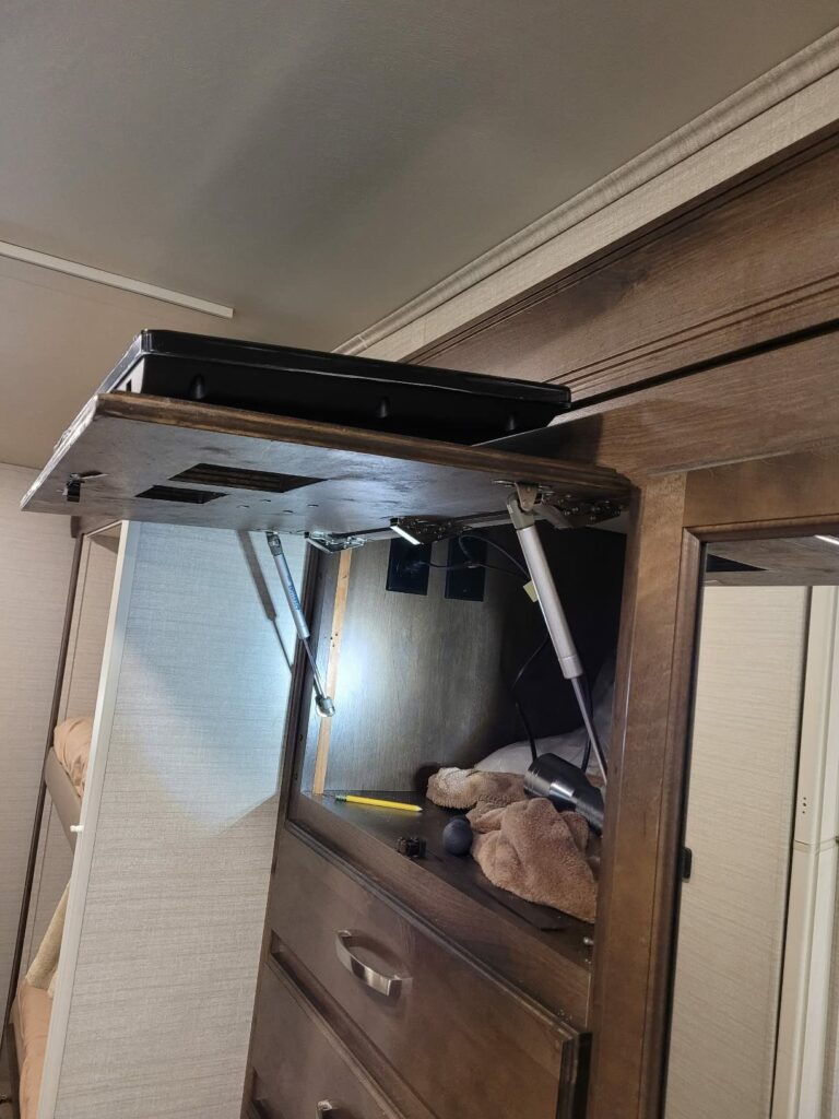 to hold a door in my camper on which I have my TV mounted.