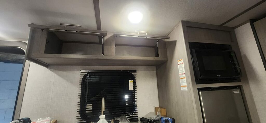 install gas spring lift on the camper cabinets door
